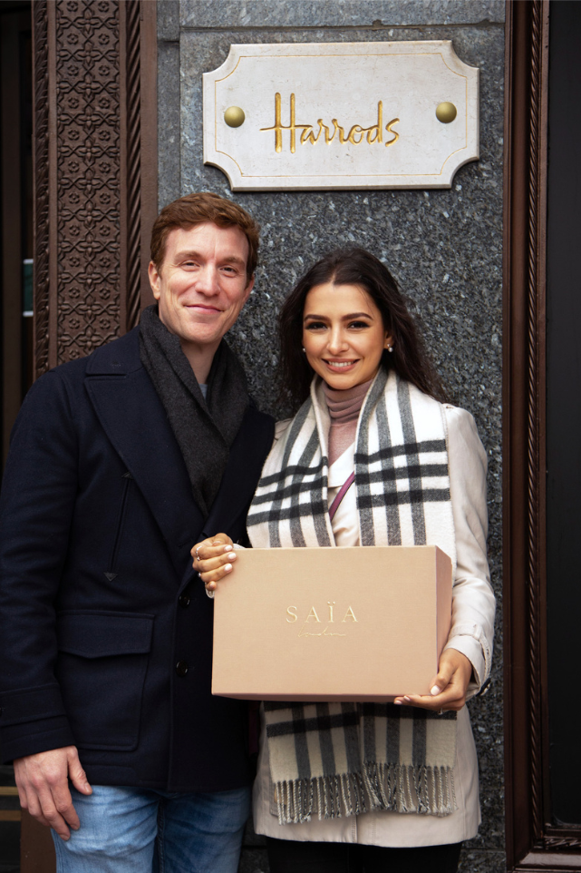 Cristina at Harrods holding a SAÏA box